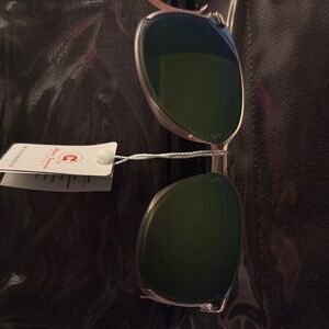 Sunglasses.  Brand new with tags. Too large for my face